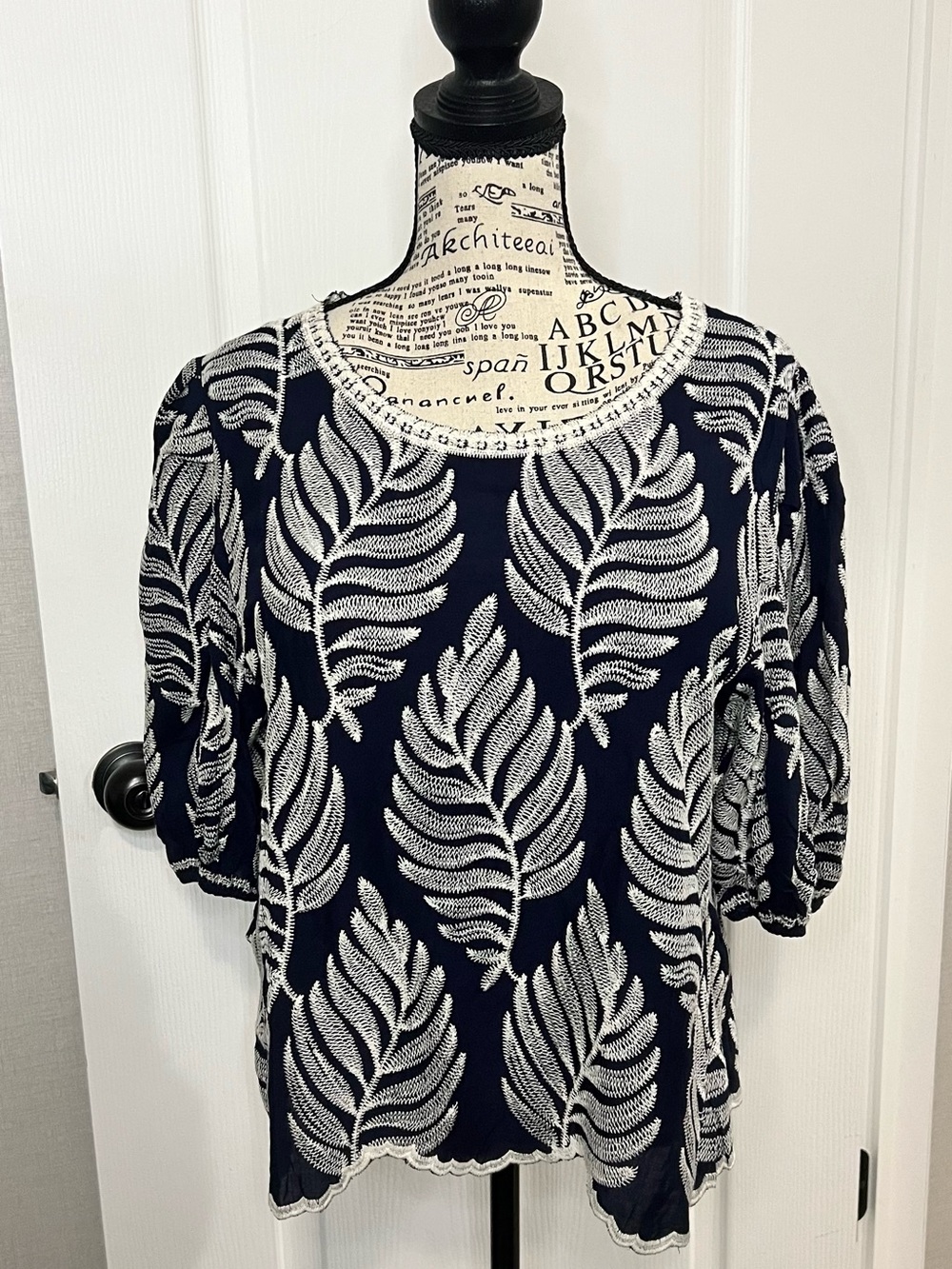 Solitaire Navy Top with White Leaf Jacquard Pattern